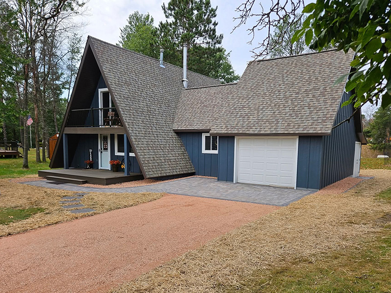 Paver driveway apron and walkway installed at an A-frame cabin in Nekoosa, Wisconsin